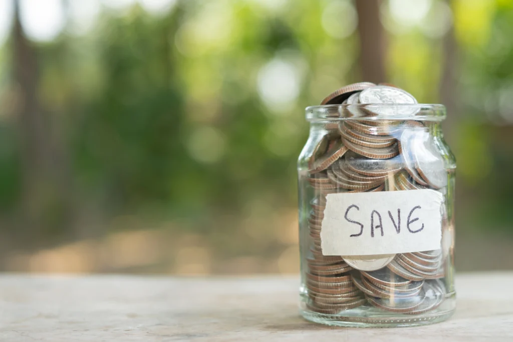 coins glass jar money saving financial concept